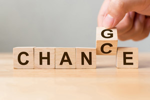 Hand flip wooden cube with word "change" to "chance", Personal development and career growth or change yourself concept